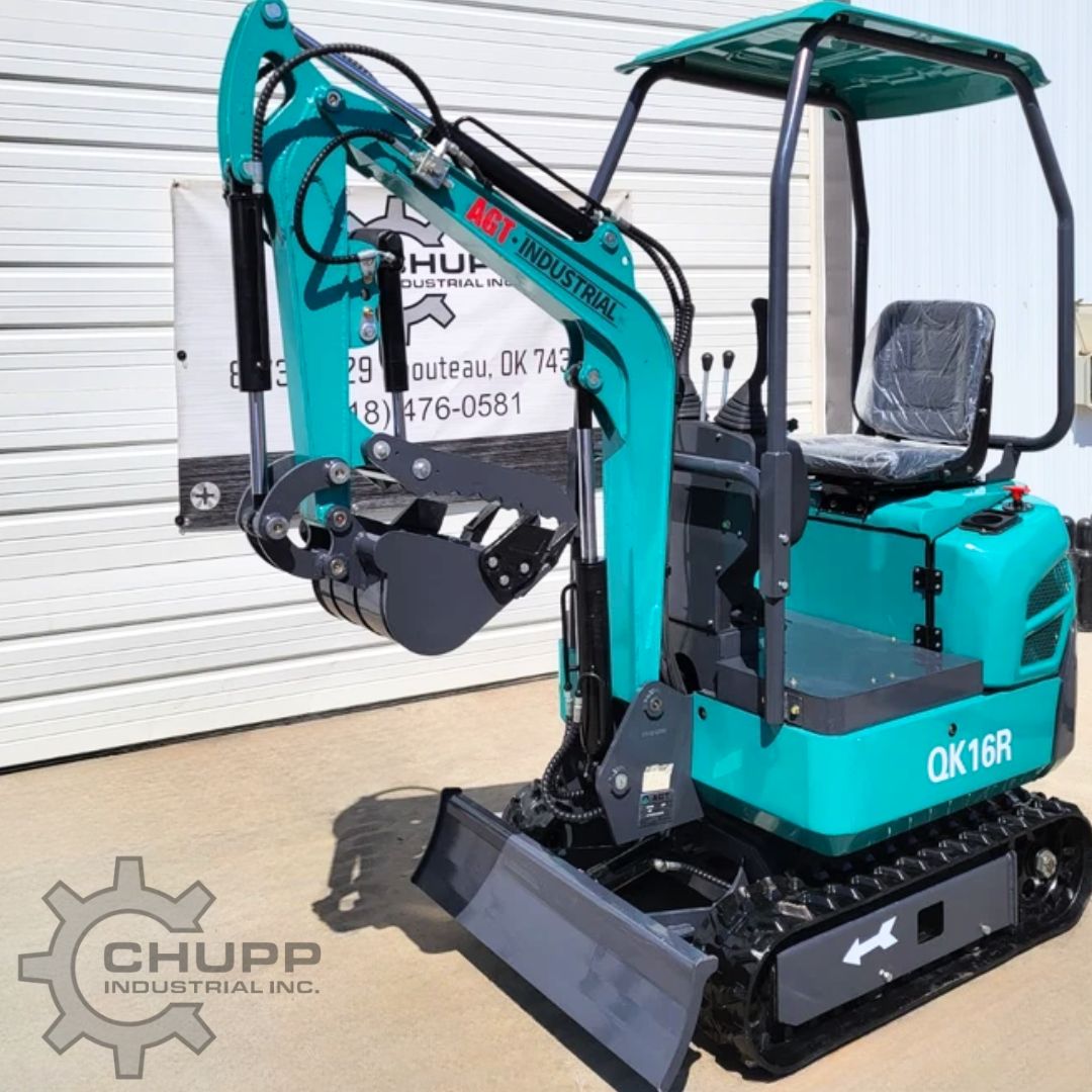 Teal QK16R mini excavator with canopy, open operator seat, rubber tracks, dozer blade and thumb bucket