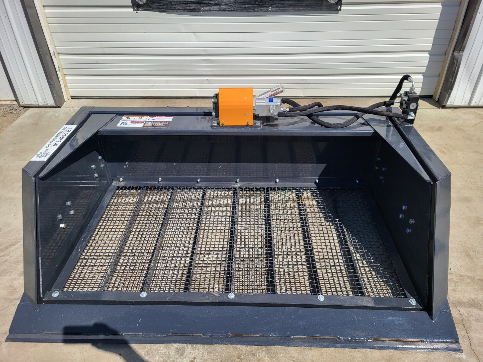 72" Vibrating Soil Screening Bucket, overhead view showing full mesh width and motor.