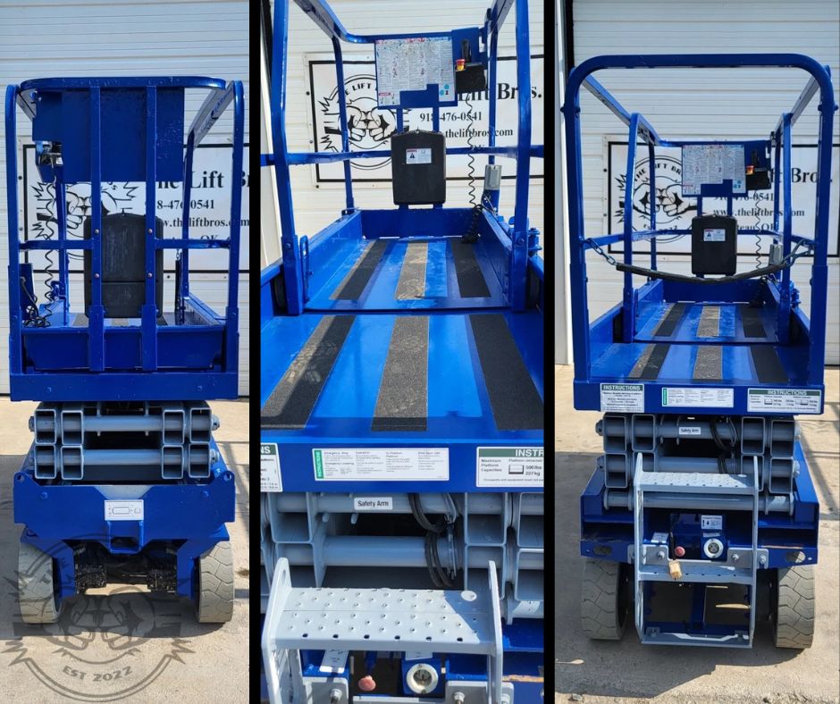 Blue scissor lift: rear, the platform deck with anti-slip strips and control box, and the front with the deck extension
