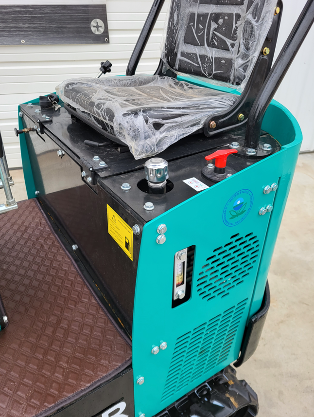 WH12R operator seat, hydraulic tank fill cap, red control valve lever and hydraulic sight gauge
