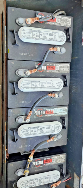 Skyjack S3219 battery bank: Pro-Guide 6-volt batteries wired in series with copper cable connectors