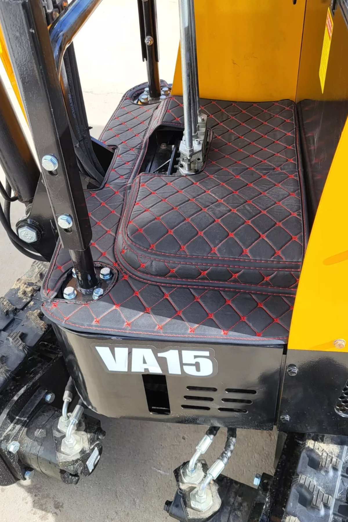 MIVA VA15 operator deck with quilted black and red floor padding, control lever bases and the VA15 decal