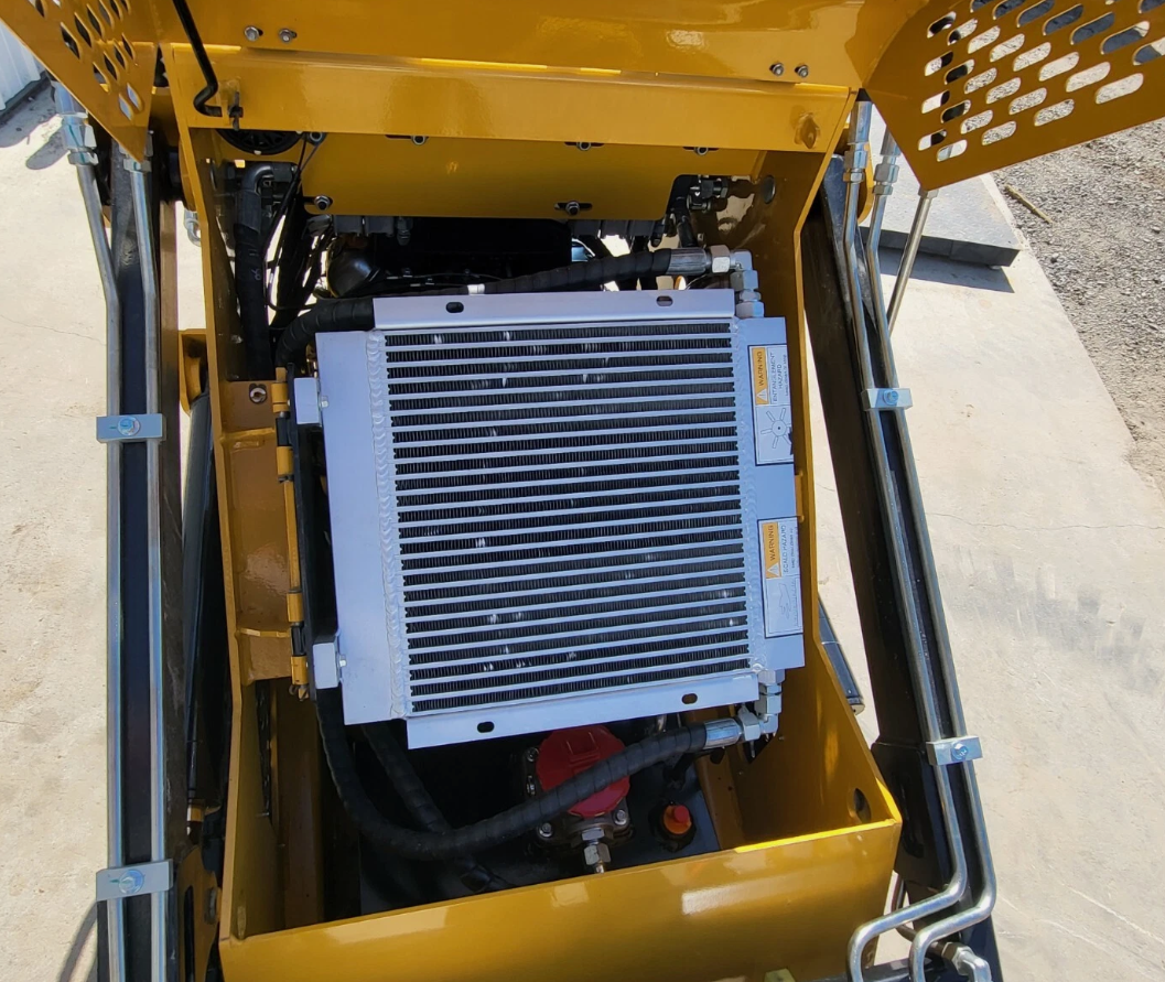 AGT MX-CRT23 hydraulic oil cooler under the raised engine hood with steel hydraulic lines