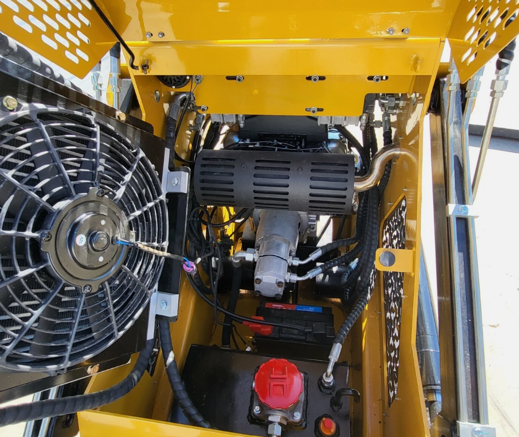 AGT MX-CRT23 engine bay with cooling fan, black muffler, hydraulic gear pump, battery and red fuel cap