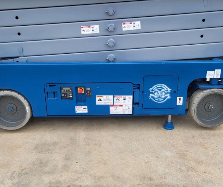 Genie GS-3232 chassis with lower control panel, emergency stop button, solid tires and lowered scissor stack