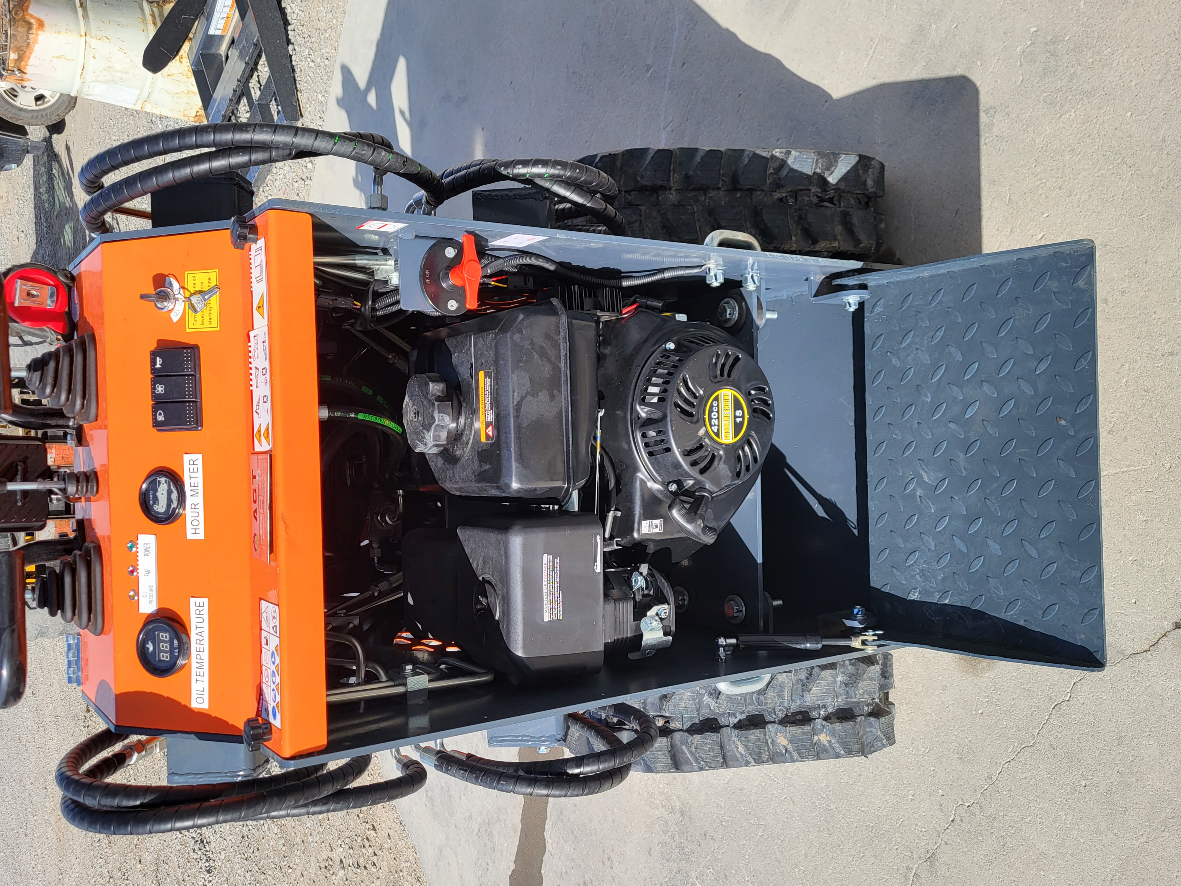 AGT YSRT14 with the engine cover open, showing the gasoline engine, recoil starter and the orange control panel