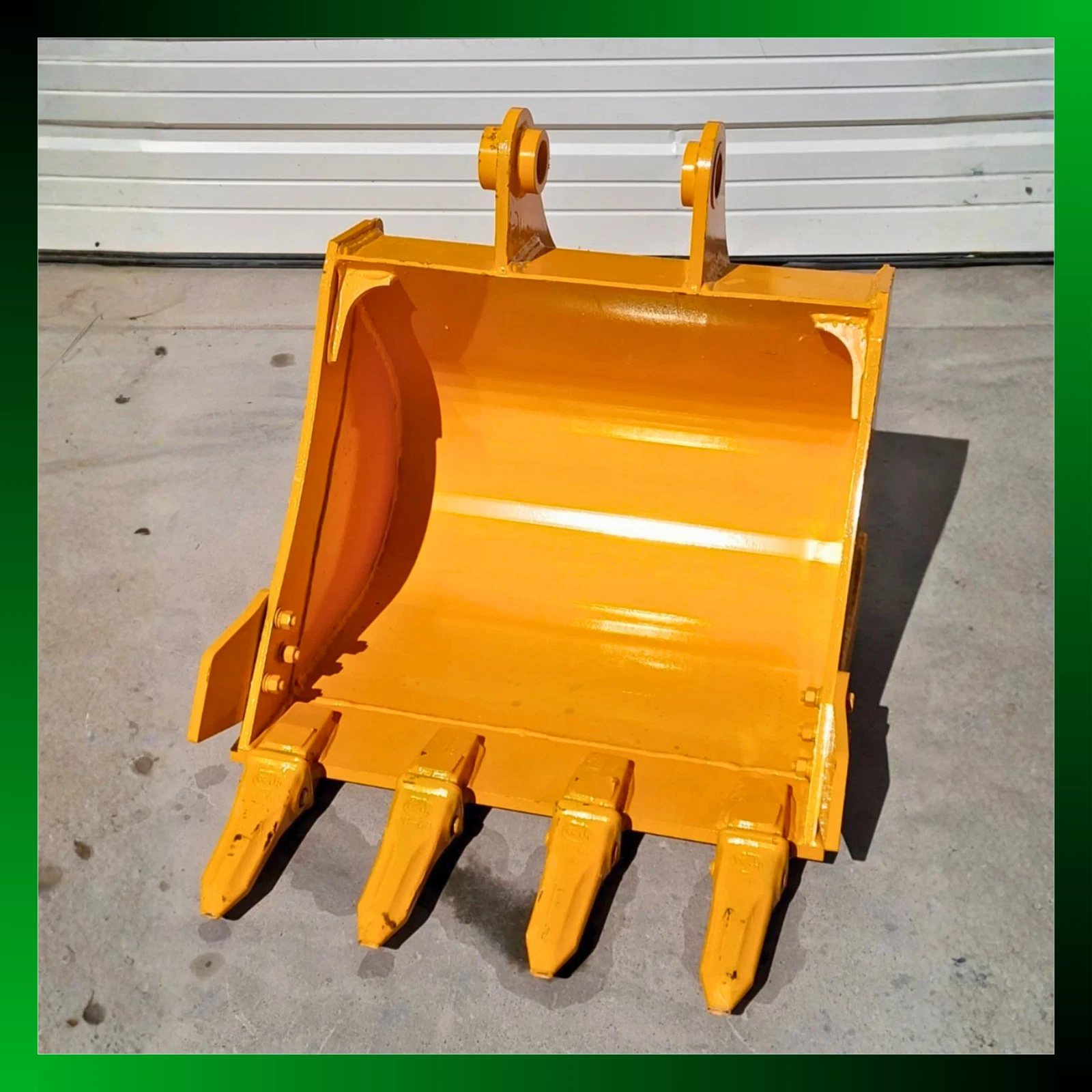 Yellow 24-inch excavator bucket, open face, four bolt-on teeth, side cutters and twin pin-boss ears