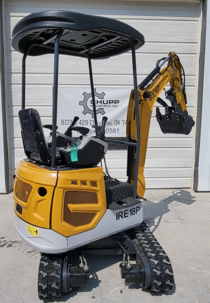 IRE18P mini excavator with black canopy, mesh engine vents and boom raised to the side