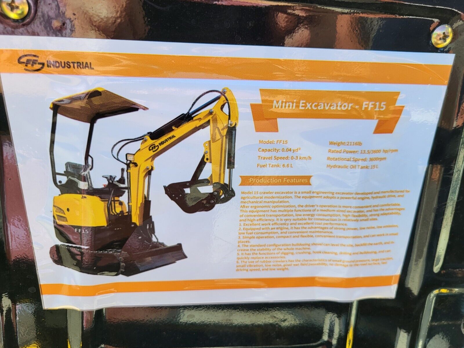 FF15 spec placard: 2,116 lb, 13.5 hp at 3,600 rpm, 0.04 cu yd bucket, 0-3 km/h travel, 6.6 L fuel, 15 L hydraulic tank