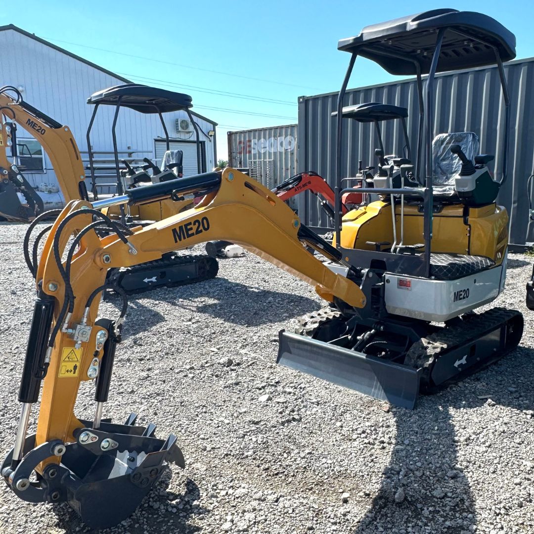 ME20 mini excavators parked side by side, yellow booms, open canopies, rubber tracks, toothed buckets and push blades