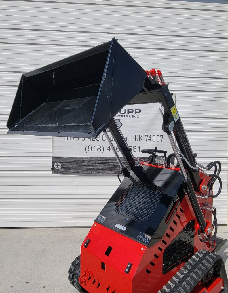 Red mini skid steer on rubber tracks with the black bucket raised to full dump height