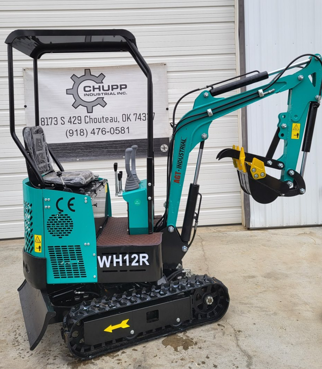 Teal WH12R mini excavator with black canopy, digging bucket and thumb, backfill blade and rubber tracks