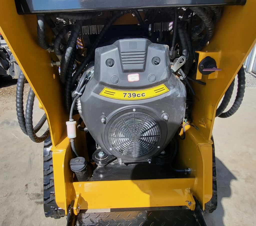 AGT MX-CRT23 739cc gasoline engine mounted in the yellow frame with hydraulic lines and inline fuel filter
