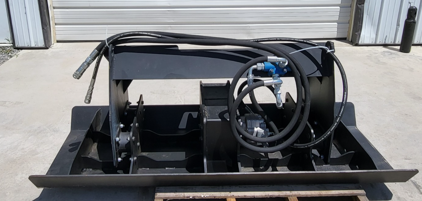 JCT vibratory plate compactor: black steel plate with hydraulic motor and looped hoses on a quick-attach frame
