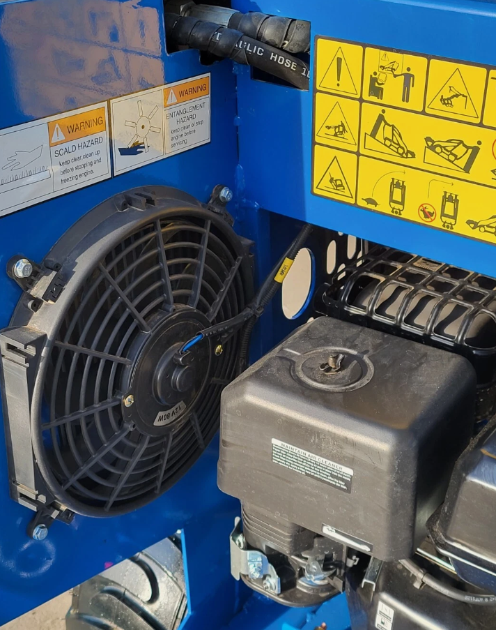 AGT mini skid steer engine bay: hydraulic oil cooler fan on the blue frame next to the gasoline engine
