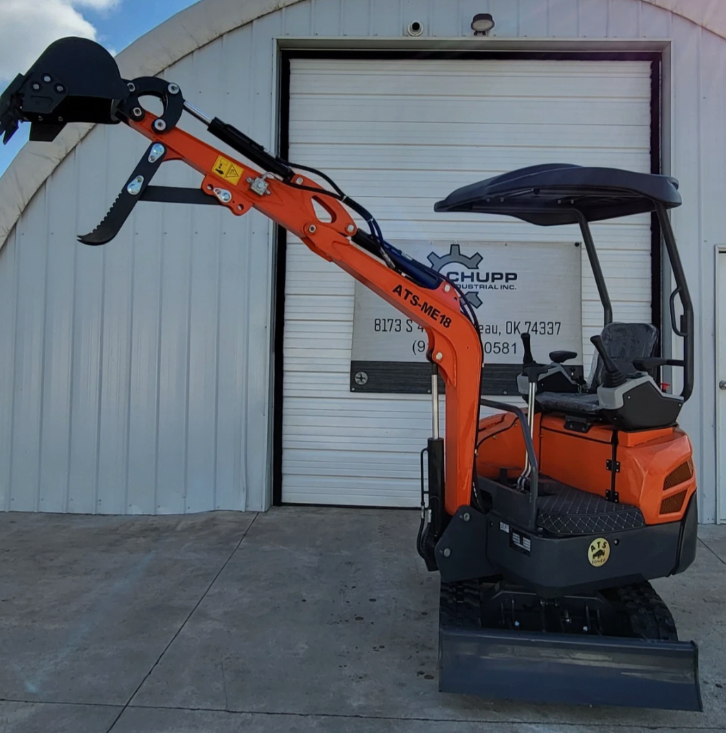Orange ATS-ME18 mini excavator with the boom extended, open canopy, rubber tracks and dozer blade