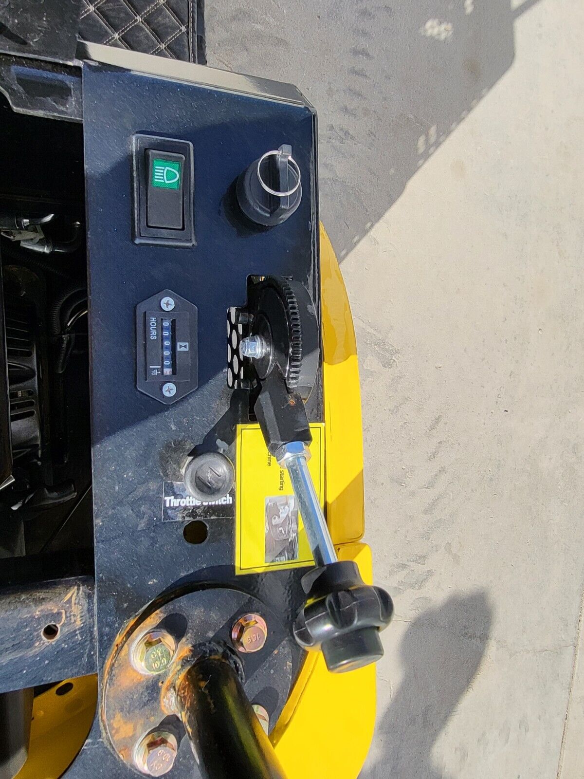 AGT QH12R control panel: ignition key switch, work-light switch, hour meter at zero and throttle latch