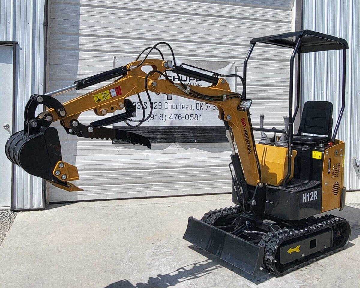 AGT H12R mini excavator, boom out with the toothed bucket and hydraulic thumb, backfill blade and rubber tracks