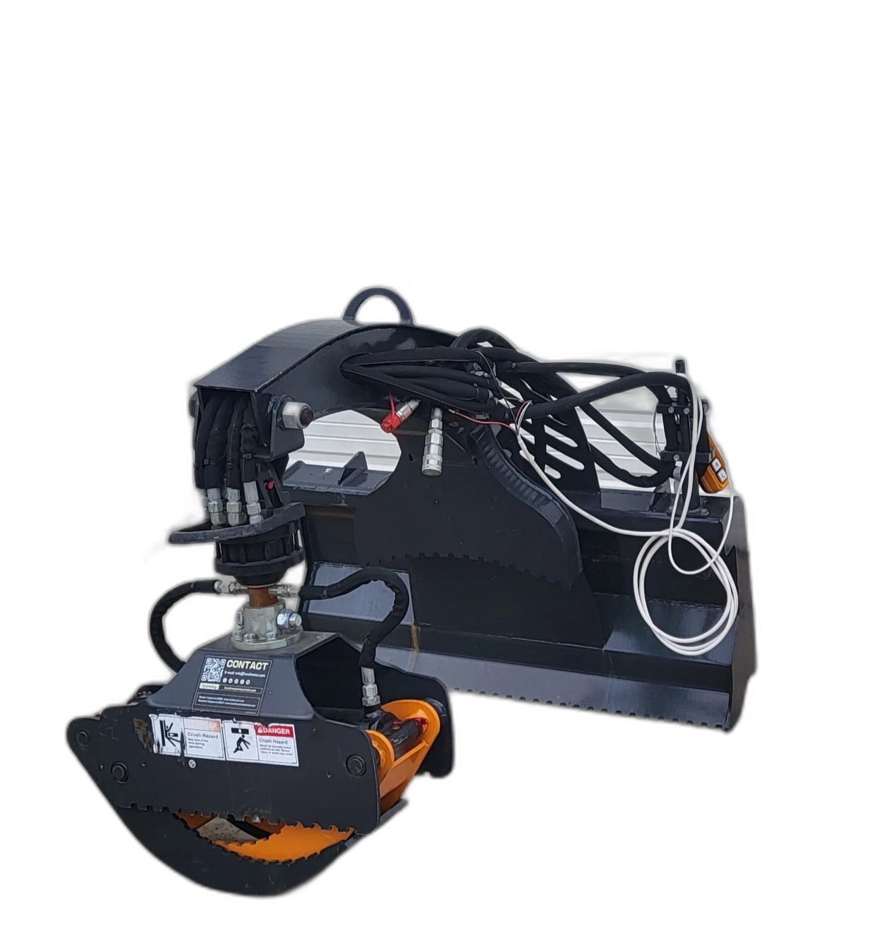 Rotating grapple with an orange serrated jaw on a hydraulic rotator, boom arm and hydraulic hoses