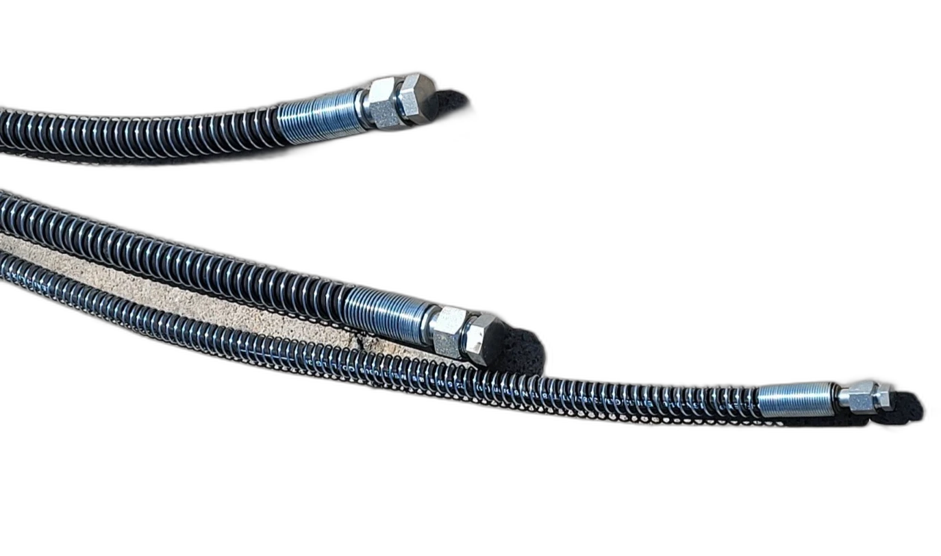 Three spiral-wrapped hydraulic hoses with zinc-plated straight fittings