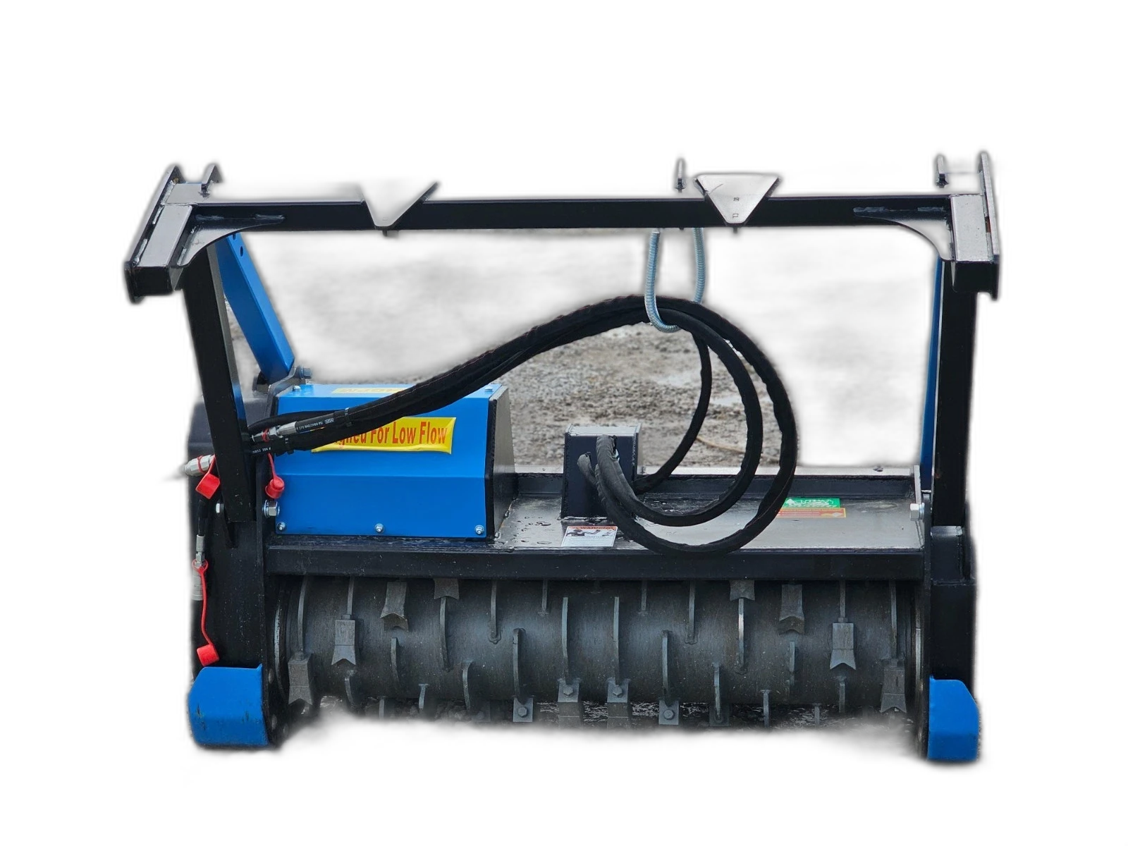 Raytree drum mulcher, blue motor housing with Designed For Low Flow decal over the toothed drum rotor