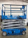 Genie GS-2632 scissor lift, platform lowered, front view, tag G166