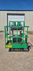 JLG E300AJP boom lift, platform lowered, front view