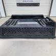 Wolverine rock rake skid steer attachment, rear view with perforated grate deck and hydraulic hose