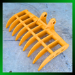 Yellow 38-inch excavator root rake, eight curved tines viewed from above, CAT 303 38in stamped on end tine