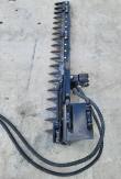 Sickle mower bar stood on end, pointed cutter guards down its length, mount plate and coiled hoses
