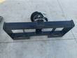 Wolverine hydraulic auger drive unit: motor and gearbox on a skid steer quick-attach frame with hoses