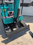CFG KV16R mini excavator, rear view with operator seat, hydraulic lines, and dozer blade