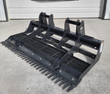 Wolverine 72-inch land leveler planer: black grid frame with tine bars and skid steer mount