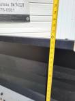 Tape measure at the side of the push blade, reading about 24 inches of height