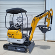 ME20 mini excavator with 3-tooth bucket arm in raised position