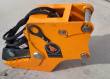 Orange Wolverine attachment head with mounting pins, coiled hoses and the Wolverine decal