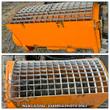 Landhonor cement mixer bucket, orange drum with steel grate over wet concrete mixing inside; example photo