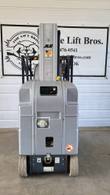 JLG 20MVL mast lift power unit end: control panel, charger port and rear wheels