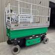 JLG 3246ES electric scissor lift, green scissor stack and silver platform, stowed, 3/4 view