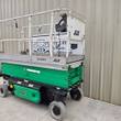JLG 3246ES electric scissor lift, green base, silver deck and rails, stowed, 3/4 view