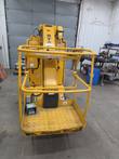 Yellow Haulotte Star 26J platform front with 500 lbs capacity decal, foot switch and stowed mast