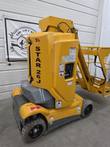 Yellow Haulotte Star 26J mast lift, rear 3/4 view, gray counterweight and ground controls
