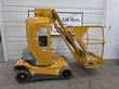 Yellow Haulotte Star 26J mast lift, stowed, full side view with jib and work platform