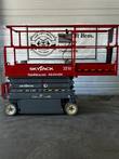 Skyjack 3219 scissor lift stowed, side view with the platform deck extension slid out