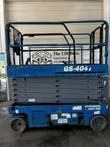 Blue Genie GS-4047 scissor lift stowed, side view of the platform, gray scissor stack and chassis