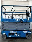 Genie GS-4047 scissor lift stowed, opposite side with platform control box and ground controls on the chassis