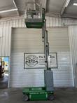Genie GR-20 Runabout mast lift raised to full height inside the shop, platform near the ceiling