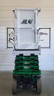 JLG 2632ES scissor lift, stowed, end view of the platform and scissor stack