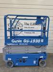 Blue Genie GS-1930 electric scissor lift, stowed, right side with ground control panel