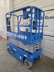 Genie GS-1930 scissor lift, stowed, front three-quarter view of platform, scissor stack and wheels
